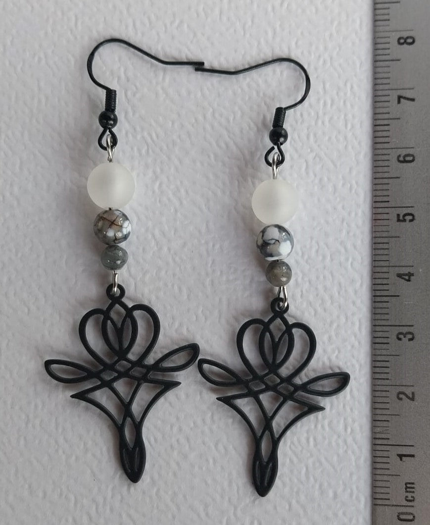 Boucles d'oreilles perles veines du dragon et breloques noires graphiques