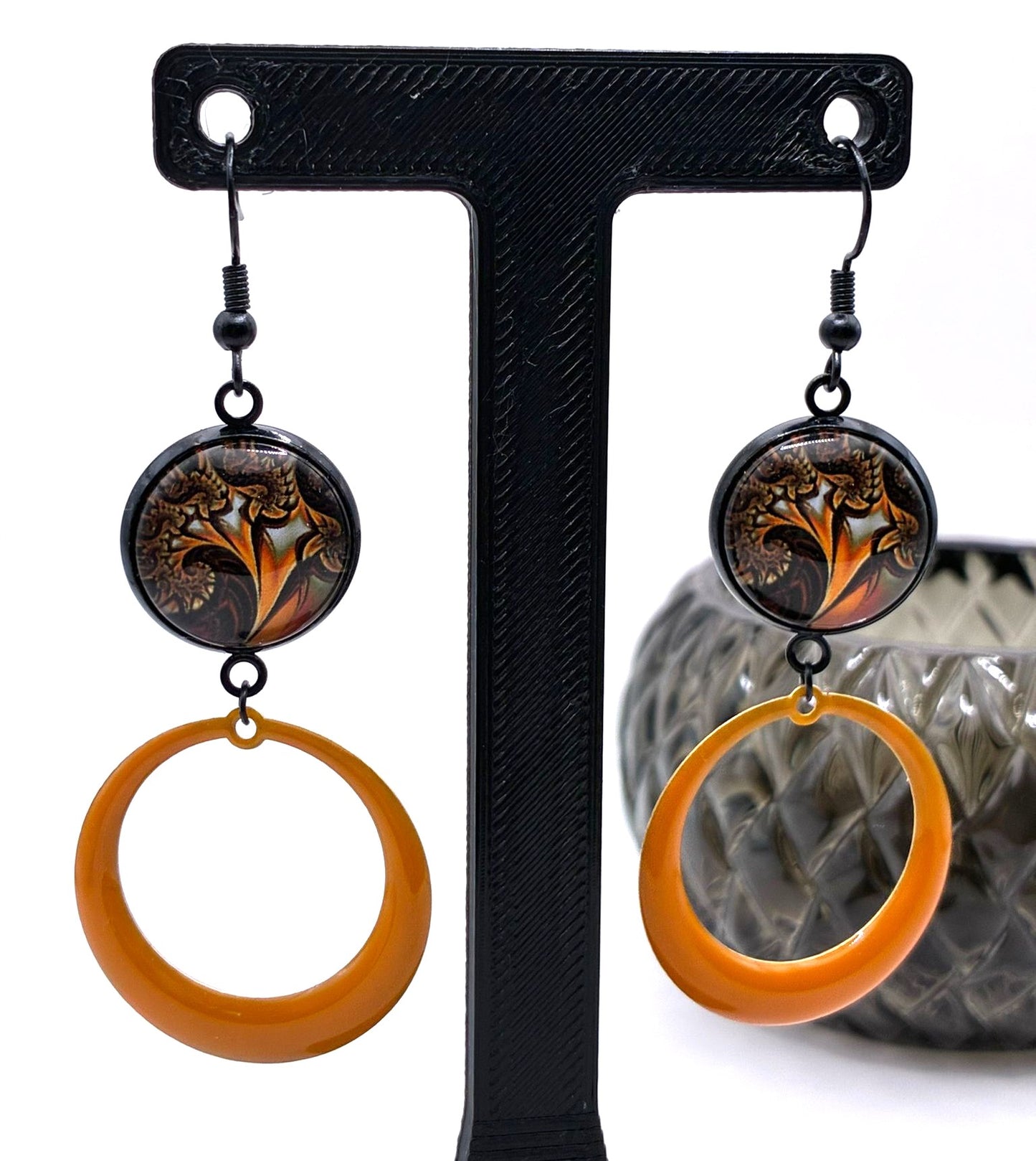 Boucles d’oreilles motif psychédélique. Orangé.